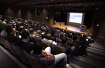 View from the back of a lecture theatre filled with students
