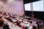 Attendees watching a speaker session at Synthetic Biology 2022