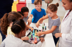 group of children doing a scientific outreach activity